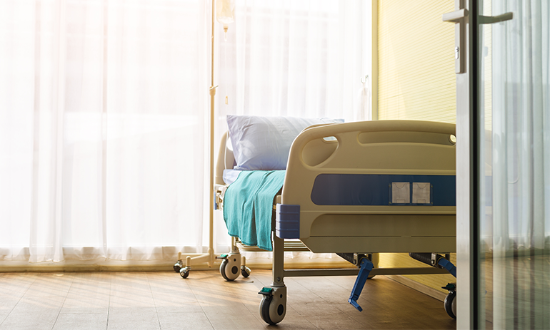 Empty hospital bed