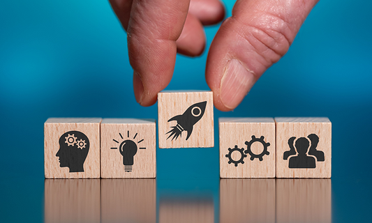 building blocks lined up to form a business