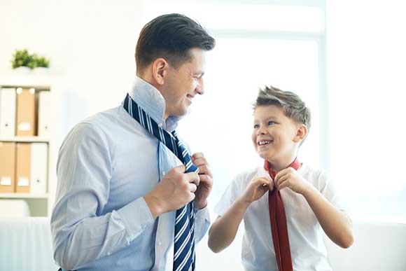Father and son tie ties