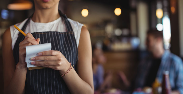 Waitress taking order