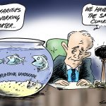 Turnbull sat at his desk with fish in a bowl fighting for funds