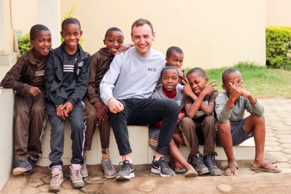 Matt with children in Tanzania