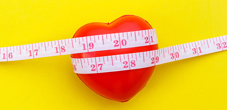 heart with tape measurement