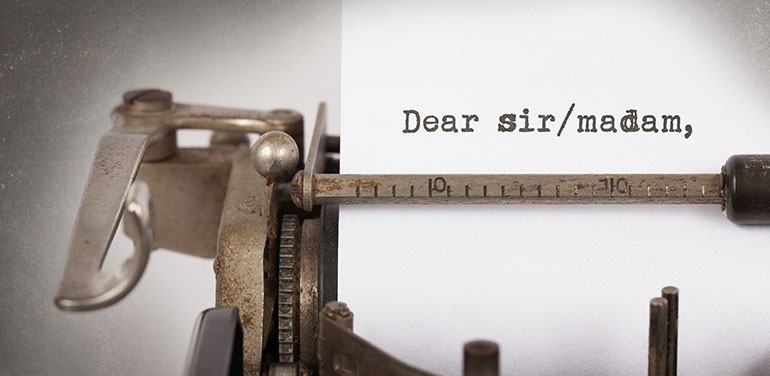 writing dear sir or madam on a typewriter