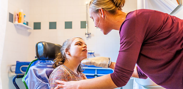 Nurse with a child with a disability