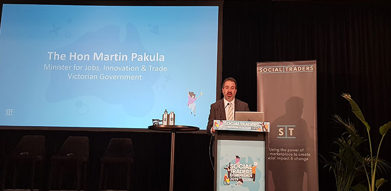 Martin Pakula announcing SENVIC at the Social Traders conference.