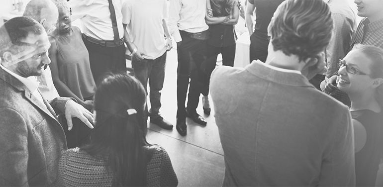 black and white image of people networking