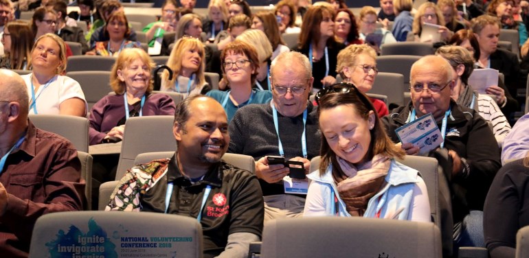 audience sitting at a conference