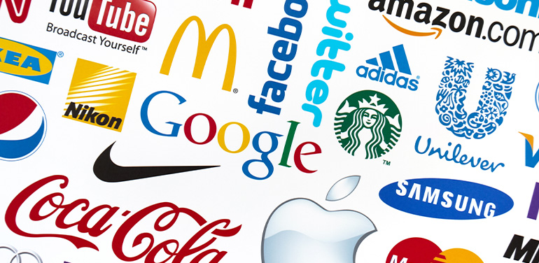 A logotype collection of well-known world brand's printed on paper. Include Google, McDonald's, Nike, Coca-Cola, Facebook, Apple, Yahoo, YouTube, and others.