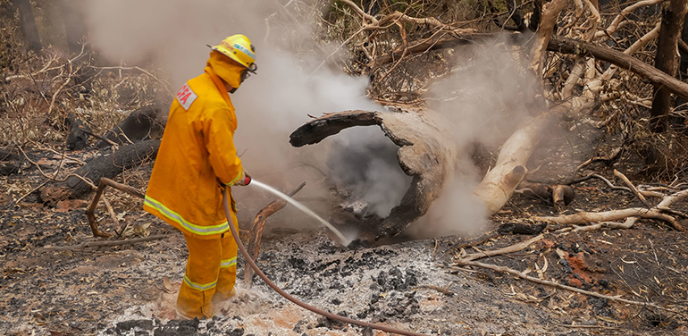 CFA Volunteer Firefighter putting out a bushfire
