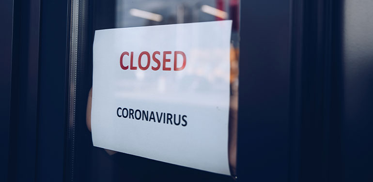 sign in door saying closed, coronavirus