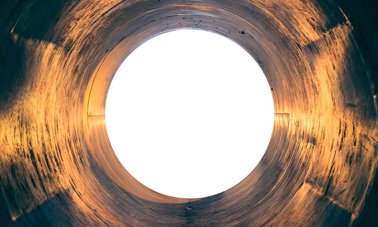 close up showing the light at the end of a tunnel