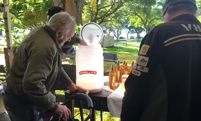 Old men making ginger beer
