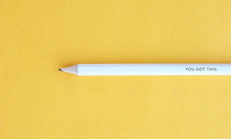 Pencil with the words "you got this on" printed on it, on a yellow background