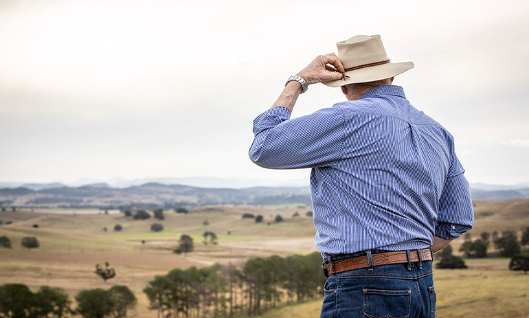 John Seccombe from the Northern Co-operative Meat Company looking over the land.