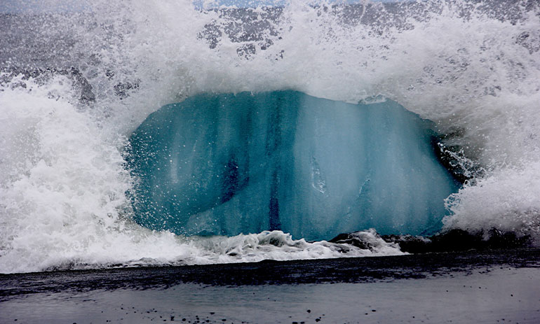 waves crashing over melting icecaps.
