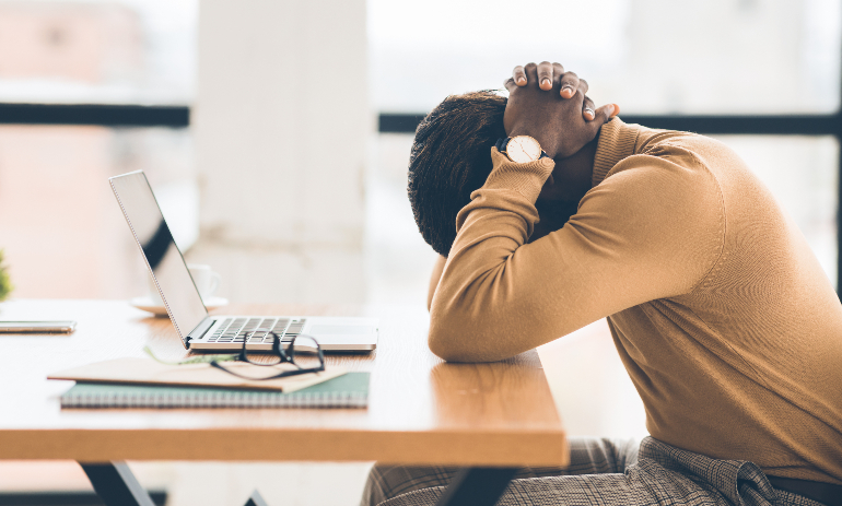 Stressed worker suffering burnout