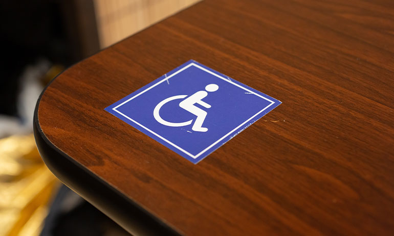 accessible sign on a table