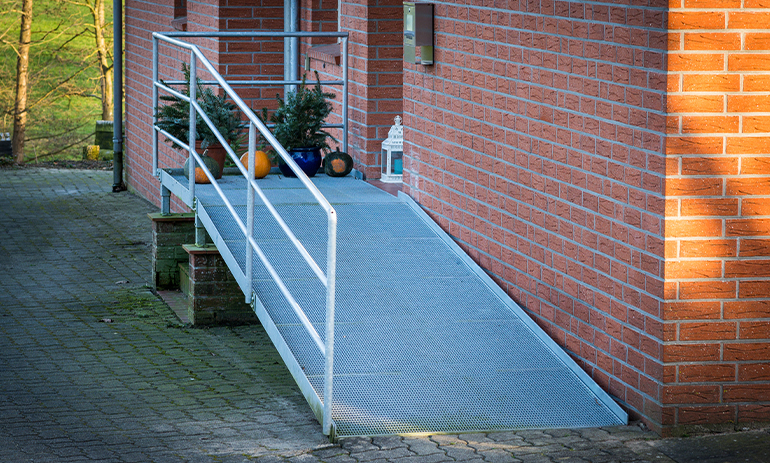 a ramp for a wheelchair into a house