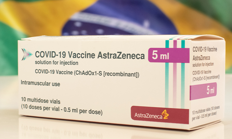 Box containing AstraZeneca vaccine with Brazilian flag in the background