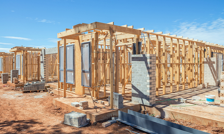 wooden frames of new houses, construction of new homes
