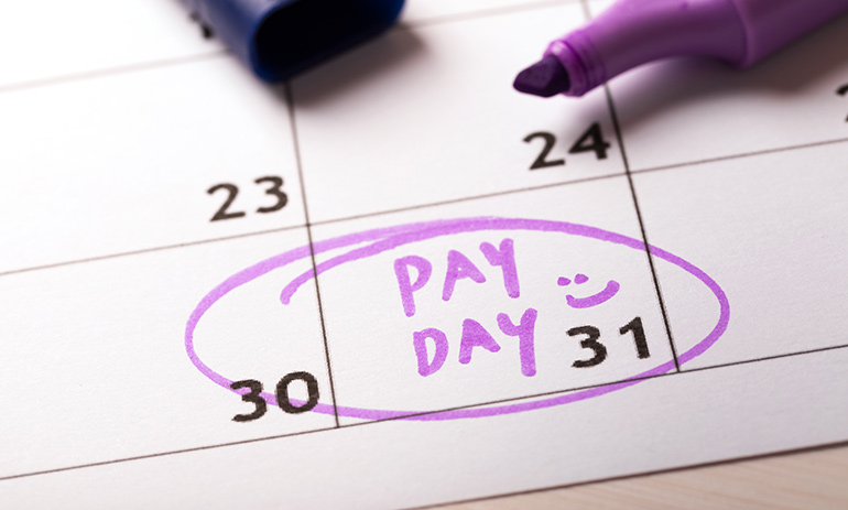 a calendar with pay-day written on it