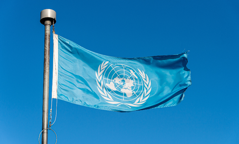 United Nations flag over blue sky in Quebec City