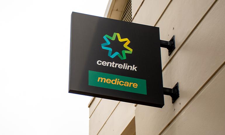 Medicare and Centrlink sign outside of a building
