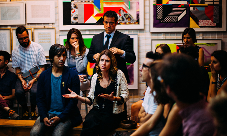 group of people talking, public forum