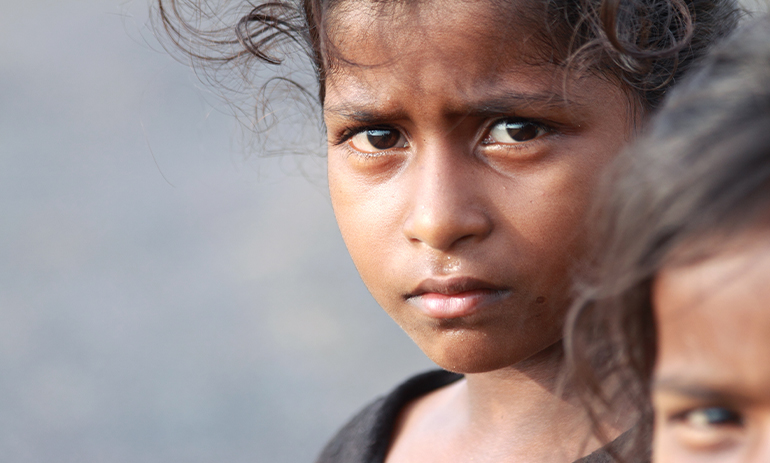 young Indian girl with sad expression