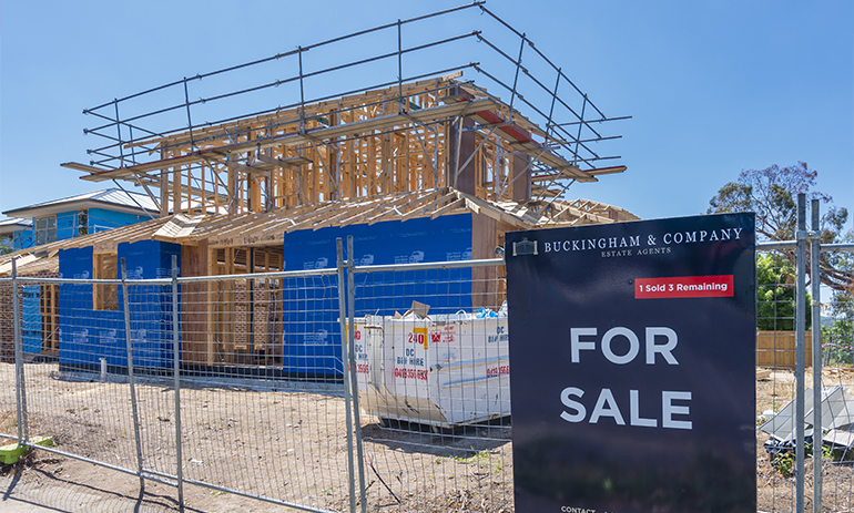 New houses under construction for sale in a suburb in Melbourne.