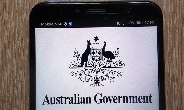 Australian Government logo displayed on a modern smartphone