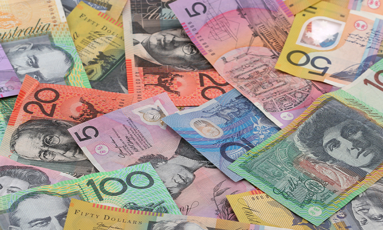 A close up off a pile of australian dollar bills