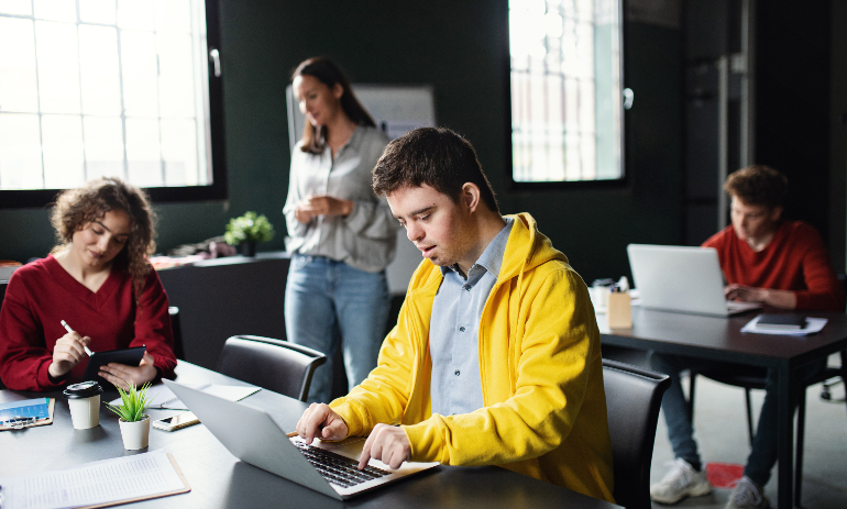 Person with disability working on laptop