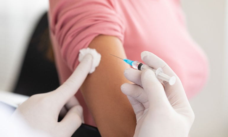 Person receiving vaccination