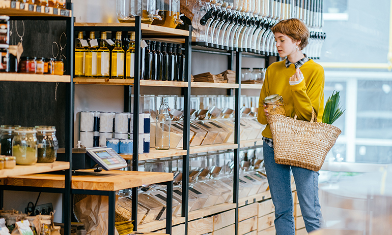 woman shopping in a sustainable food store