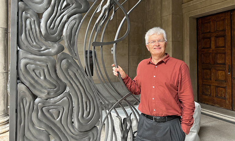 Glyn Davis standing by the gates of Yirranma Place