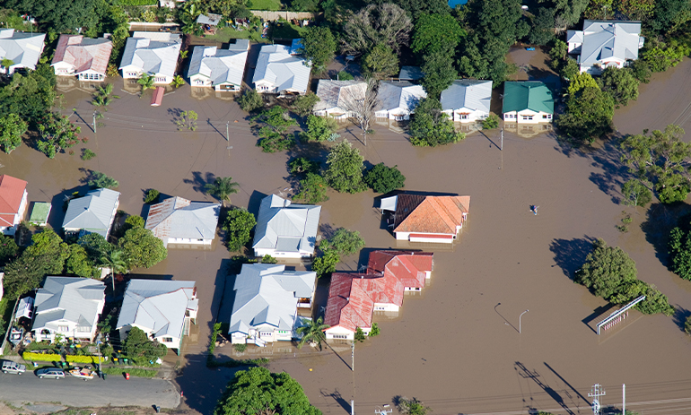aerial view of houses in flood