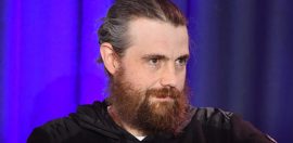 Cannon-Brookes takes stake in AGL, vows to fight demerger
