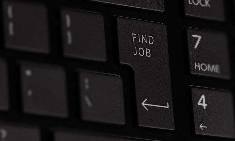 A close up image of a computer keyboard. The 'enter' or 'return' key now reads 'find job' instead.