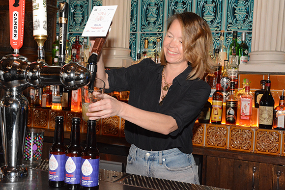 Line of Duty and Motherland star Anna Maxwell Martin pulls the first pint of Thank Brew at The Old Queen's Head pub in London.