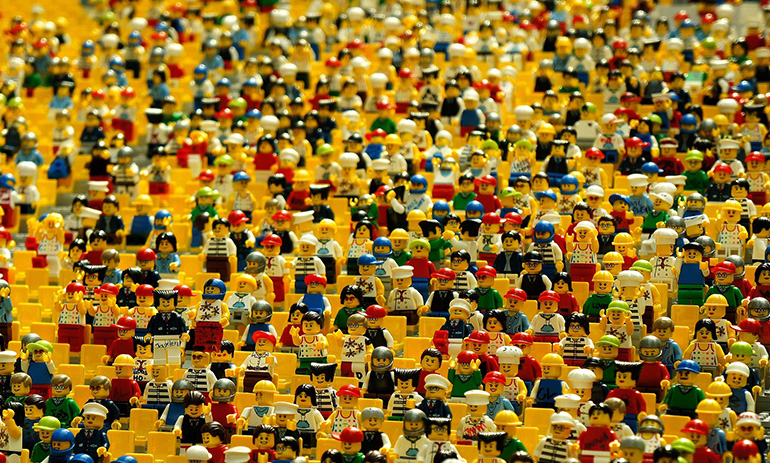 A crowd of yellow Lego figures.