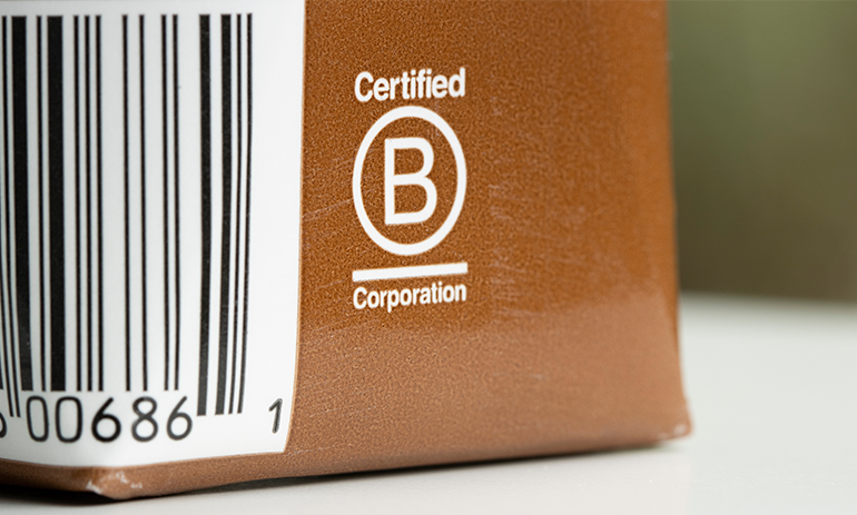B corp logo on brown box