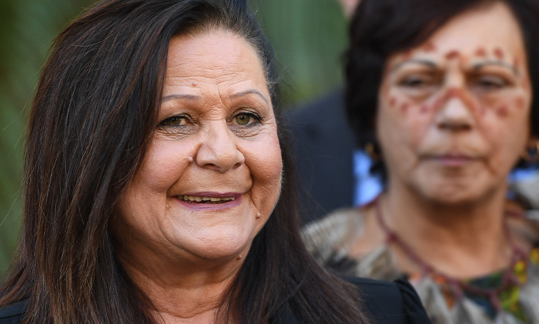 Jill Gallagher, AO, an Aboriginal woman, smiles at the camera.
