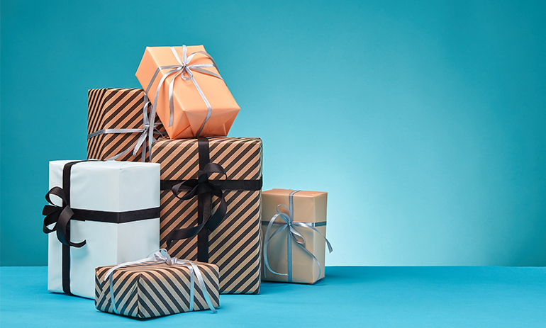 Stack of presents against a blue background