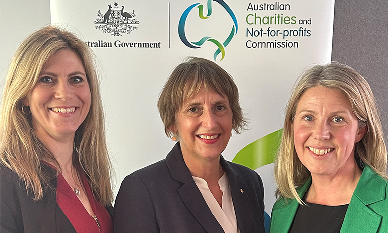 Anna Longley, ACNC Assistant Commissioner, Sue Woodward, incoming ACNC Commissioner, and Deborah Jenkins, acting ACNC Commissioner smiling at camera.