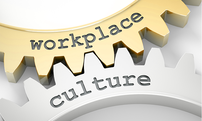 Two intersecting cogs, reading workplace and culture.
