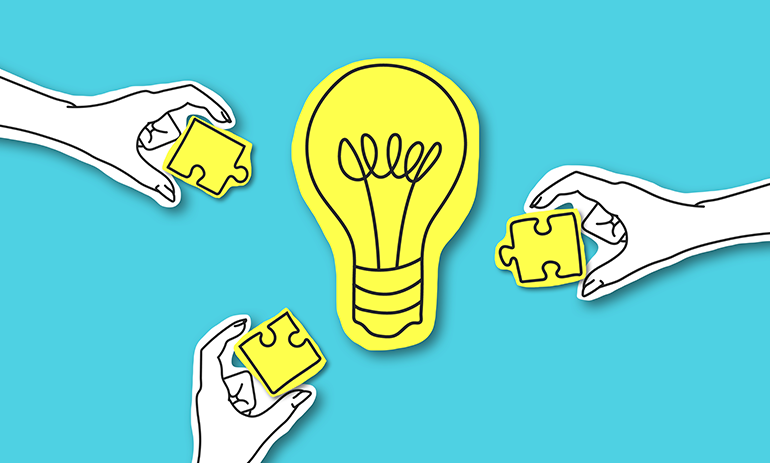 Cartoon hands holding puzzle pieces around a yellow lightbulb.